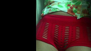 Woman in shorts starts teasing with curly hair and small waist in close-up shots