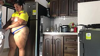 Argentinian guy fucks a curvy Colombian milf hard in the kitchen with big natural tits bouncing. She squirts and takes cumshot after intense doggystyle and missionary pounding.
