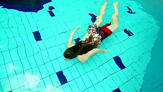 I dive underwater with hot Polish teen Marketa in bikini. we flash petite tits at public pool and beach