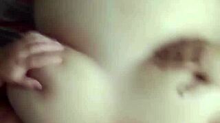 Milf plays with pussy in bathtub then sucks cock deep, rides on top, and gets cum over huge natural tits.