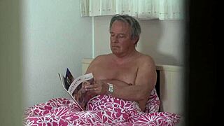 Oh man, this naughty babe is fucking that old guy in cowgirl position on the bed... so hot!