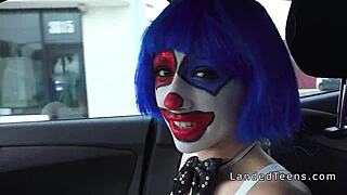 Teen in clown costume contrasts with outdoor banging to cumshot in intriguing public voyeur scene