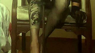 Crossdresser Maria Displays Black Nylon Pantyhose And Sexy High Heels