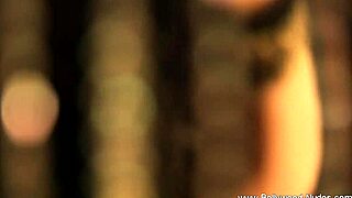 beautiful indian woman performs a seductive dance, teasing with striptease moves in softcore style.