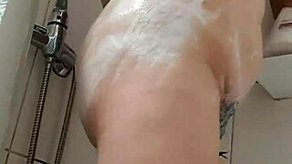 Chubby mature woman shows off her hairy pussy in lingerie