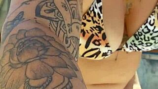 Setting up a tent on the farm while wearing a tight body outfit