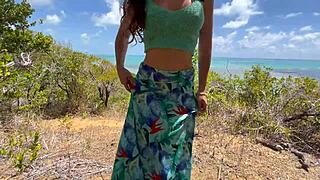 This sexy fit woman enjoys a beautiful day outdoors on the Brazilian beach with friends