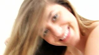 Attractive young woman engages in intimate activity on camera for the first time