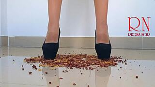 Cornflakes get destroyed with high heels boots on the floor