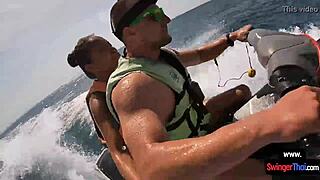 Oh man this Asian girlfriend is giving a blowjob in public on a jetski with her boyfriend.