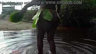 watch this busty african beauty with huge tits and ass grinding in a ritual dance then cleansing her thick body in sacred outdoor water