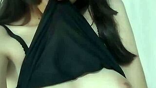 Manekizinha casually shows off her natural big tits in a cute and beautiful young Asian style.