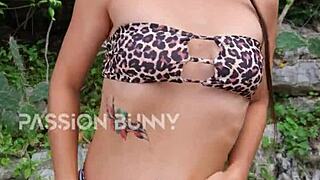 Hey, watch this cute bikini girl dance and finger outdoors!