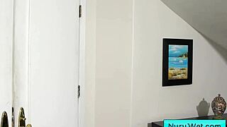 Curly brunette teen masseuse grinds wet pussy on client during nuru